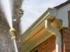 Pressure washing gutter cleaning